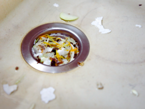 Kitchen sink clogged because of food scraps 